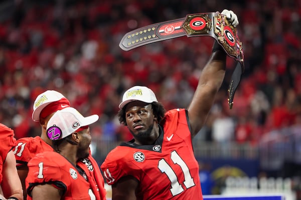 Georgia linebacker Jalon Walker celebrates the Bulldogs' SEC Championship game win over Texas.