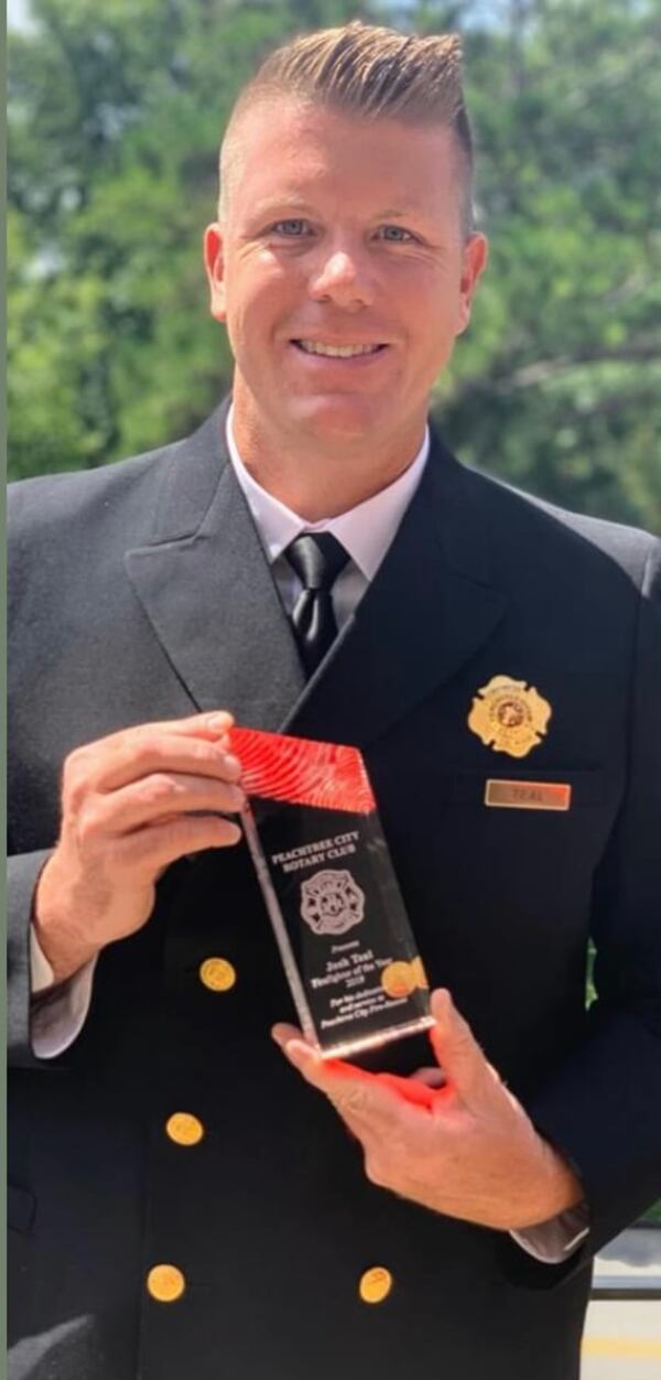 Josh Teal was awarded firefighter of the year in Peachtree City . The award was given Sept. 3 at a Rotary ceremony.