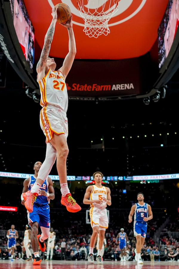 Atlanta Hawks guard Vit Krejci (27) heads to the basket against the Philadelphia 76ers during the first half of an NBA basketball game, Monday, March 10, 2025, in Atlanta. (AP Photo/Mike Stewart)