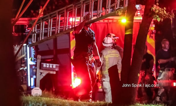 Crews with Atlanta Fire Rescue are on the scene of an early Tuesday morning fatal fire on Harvel Drive. JOHN SPINK / JSPINK@AJC.COM