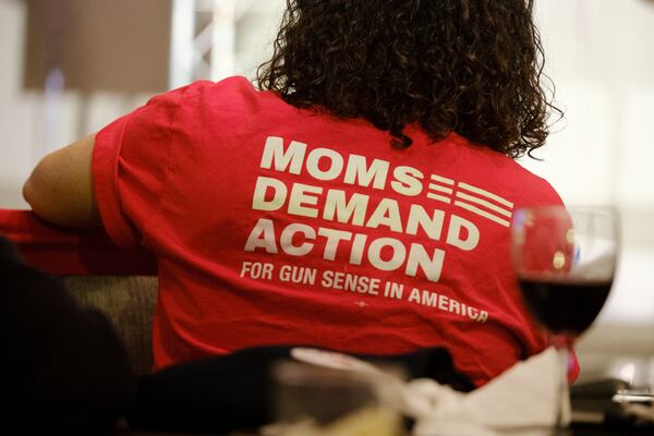 A supporter wears a “Moms Demand Action” T-shirt at U.S. Rep. Lucy McBath’s primary election night party Tuesday at the Hilton Atlanta Northeast. McBath won a three-way Democratic primary in Georgia’s 7th Congressional District. (Arvin Temkar / arvin.temkar@ajc.com)