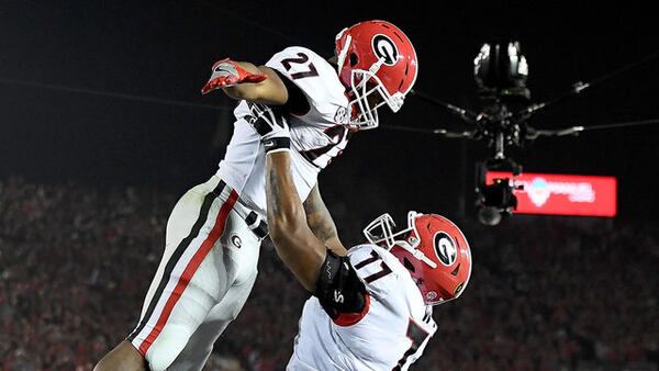 Nick Chubb #27 of the Georgia Bulldogs runs for a 50 yard touchdown in the 2018 College Football Playoff Semifinal Game against the Oklahoma Sooners at the Rose Bowl Game. Getty Images