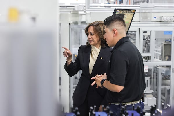 Vice President Kamala Harris tours Qcells' solar manufacturing plant in Dalton in April. The company linked a $2.5 billion expansion it announced earlier this year in Georgia to President Joe Biden’s package of incentives offered in the Inflation Reduction Act. (Natrice Miller/natrice.miller@ajc.com)