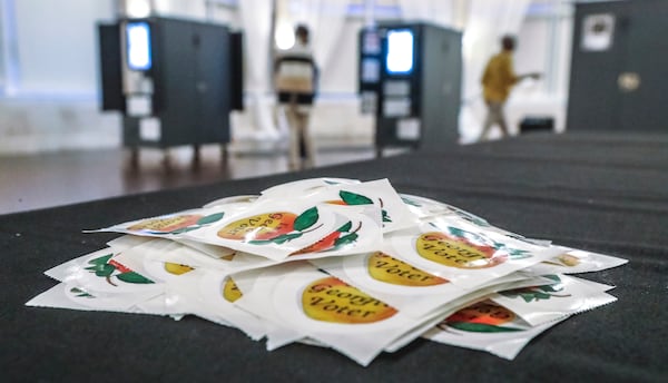 Stickers await voters on Tuesday, Aug. 11, 2020 at Park Tavern in Atlanta. A heated race for Fulton County district attorney saw a light turnout at the polls.  JOHN SPINK/JSPINK@AJC.COM

