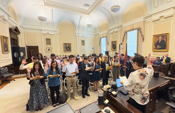 At the federal courthouse in Macon on Wednesday, 22 people from 15 nations were sworn in as U.S. citizens.