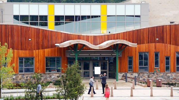 In this July 29, 2016 photo, people attend an open house at the new Sandy Hook Elementary School in Newtown, Conn., built to replace the one that was demolished where 20 first graders and six educators were shot and killed in on Dec. 14, 2012. Associated Press photo.