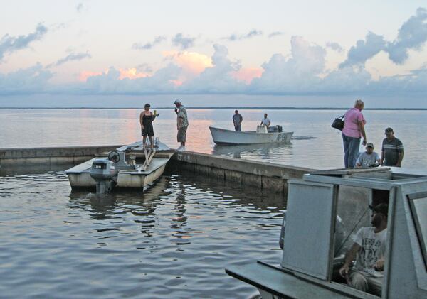 In this file photo, oystermen head out from Eastpoint, Fla. for a day of fishing in the Apalachicola Bay. DAN CHAPMAN 