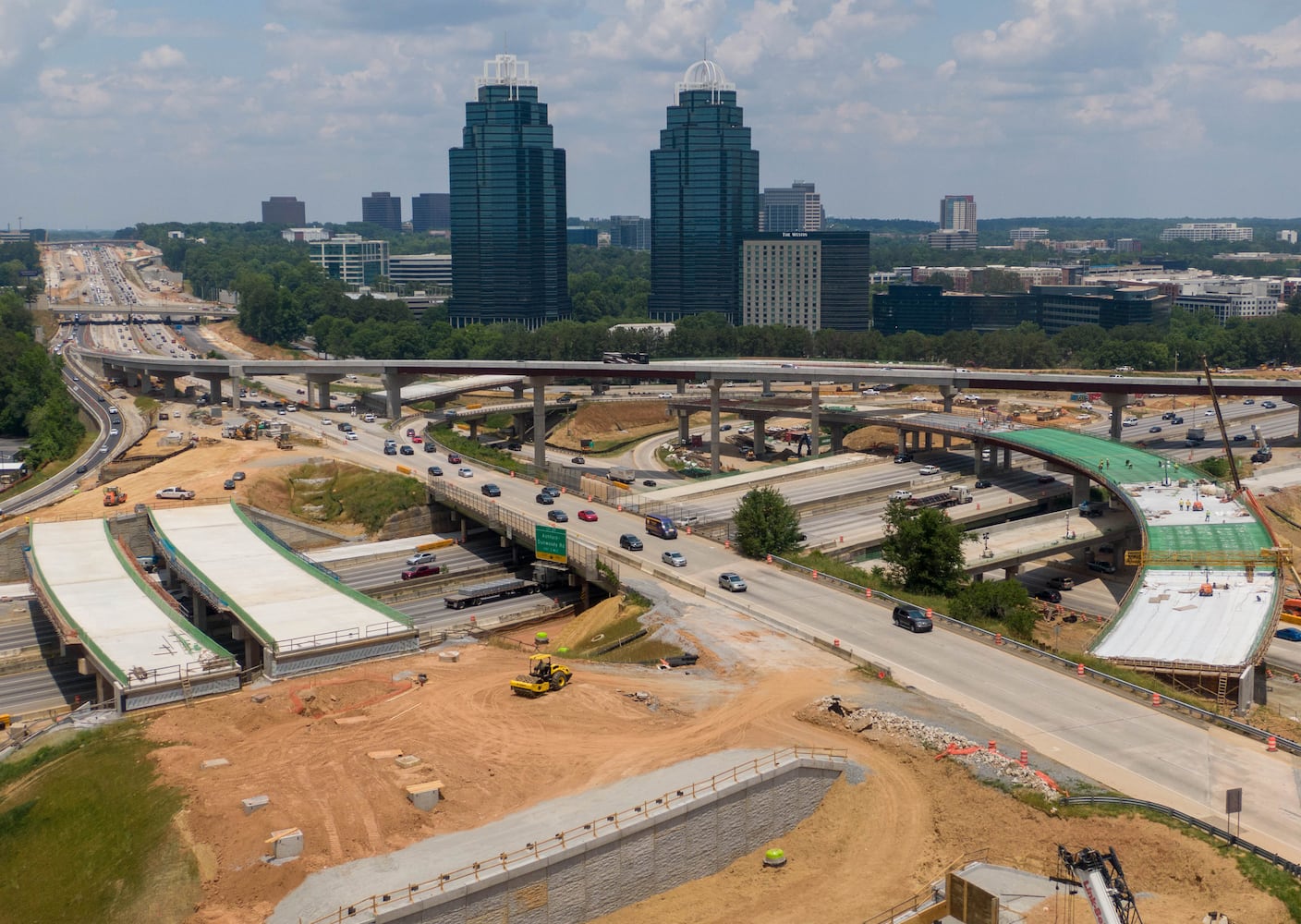 May 27, 2021 Sandy Springs - Aerial photo shows construction site of I-285 interchange at Ga. 400 in Sandy Springs on Tuesday, May 27, 2021. (Hyosub Shin / Hyosub.Shin@ajc.com)