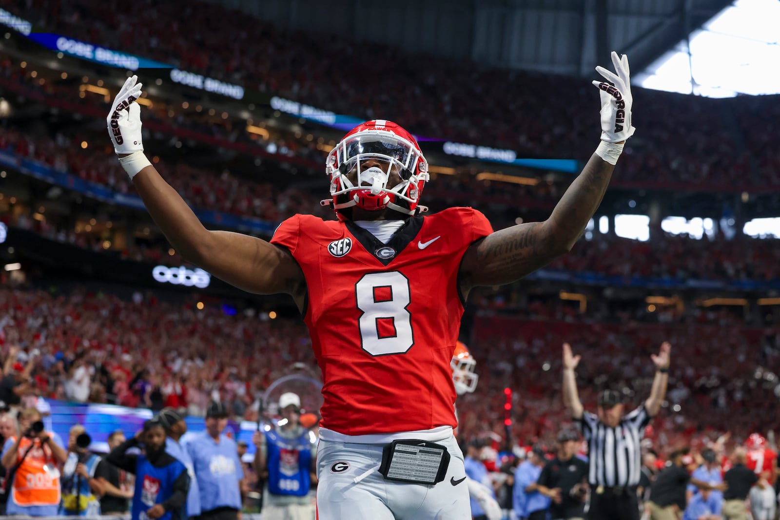 Georgia wide receiver Colbie Young (8) reacts after scoring a 7-yard touchdown during the second half against Clemson at Mercedes-Benz Stadium, on Saturday, Aug. 31, 2024, in Atlanta. Georgia won 34-3. (Jason Getz / AJC)
