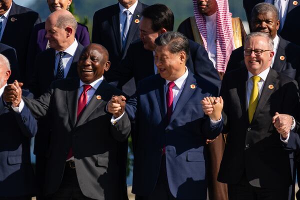 South Africa's President Cyril Ramaphosa, from front row left, China's President Xi Jinping, and Australia's Prime Minister Anthony Albanese pose with other G20 leaders at the G20 Summit in Rio de Janeiro, Monday, Nov. 18, 2024. (Eric Lee/The New York Times via AP, Pool)