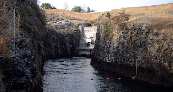 The Chattachoochee River, seen here in 2011, exits the Buford Dam powerhouse in Cumming. Lake Lanier is on the other side. (Bita Honarvar / AJC file)