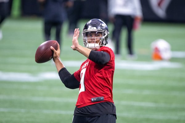 Falcons quarterback Desmond Ridder (9) runs a drill at a team training session at Mercedes-Benz Stadium in Atlanta on Friday, June 2, 2023. (Arvin Temkar / arvin.temkar@ajc.com)