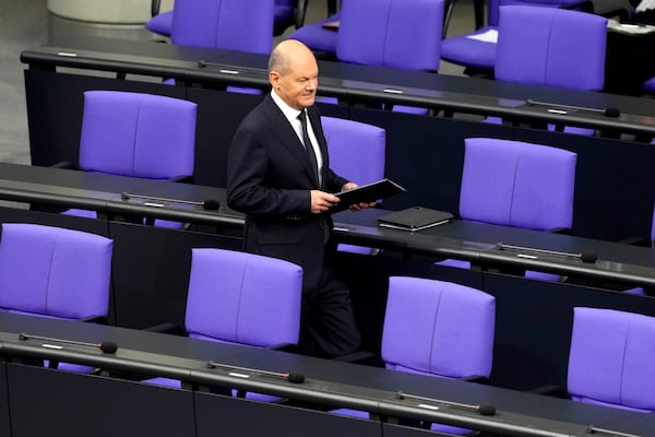 German Chancellor Olaf Scholz attends a plenary session in the German parliament Bundestag in Berlin, Germany, Wednesday, Nov. 13, 2024. (AP Photo/Markus Schreiber)