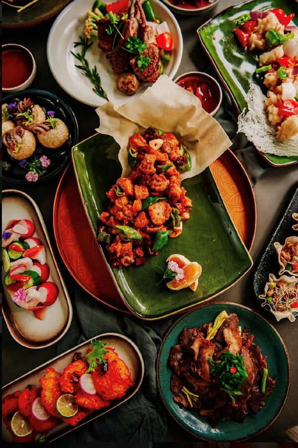 This selection of dishes from the Sparrow includes Shan City chicken (center). Courtesy of the Sparrow