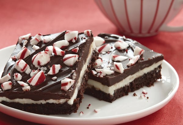 Peppermint Bars are an extravagant dessert of a fudgy brownie layered with peppermint frosting and a rich chocolate glaze. It’s OK to indulge in a holiday treat, but make sure you’re balancing it with waistline-friendly choices, as well as staying active through the day. MCCORMICK / MCT