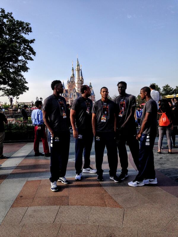 Waiting for a group picture at Shanghai Disney Resort. From left to right: Forward Sylvester Ogbonda, assistant coach Tavaras Hardy, forward Evan Jester, forward Abdoulaye Gueye, guard Curtis Haywood.