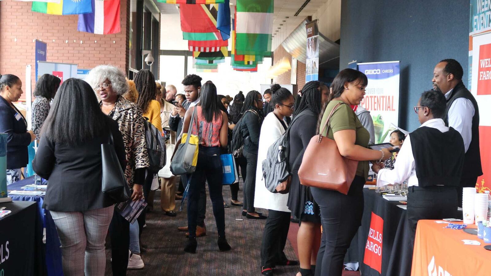 Spelman College students talk to recruiters during a career fair shortly before the coronavirus pandemic. College officials say many companies are still interested in recruiting Spelman students despite the economic downturn created by the pandemic. CONTRIBUTED