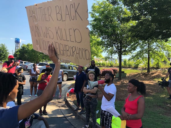 John Wade speaks to protesters outside the Wendy's on University Avenue the morning of June 13. The impromptu demonstration was organized hours after Rayshard Brooks was shot and killed in the restaurant parking lot the night before.