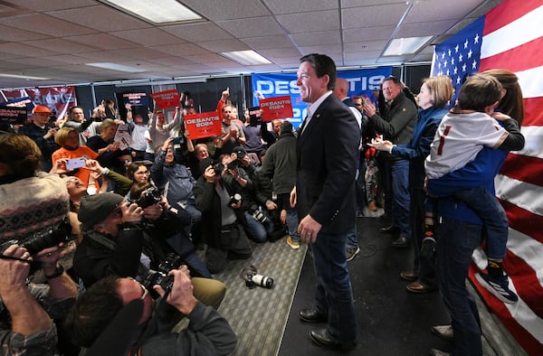 Republican presidential candidate Florida Gov. Ron DeSantis reacts as he takes on the stage during a campaign event, Saturday, January 13, 2024, in West Des Moines, Iowa. (Hyosub Shin / Hyosub.Shin@ajc.com)