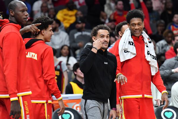 Hawks guard Trae Young celebrates during the second half in an NBA basketball game at State Farm Arena on Friday, March 18, 2022. Atlanta Hawks won 120-105 over Memphis Grizzlies. (Hyosub Shin / Hyosub.Shin@ajc.com)