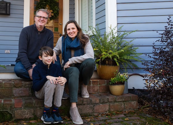 Elizabeth Feichter (right) poses for a portrait with husband Frank White (left) and son Dylan Feichter-White (middle) at their home in Atlanta on Friday, Dec. 18, 2020. Feichter is the founder of the Atlanta Food and Wine Festival, but is currently working to develop new businesses because of the festival’s cancellation due to COVID-19. (Christina Matacotta for The Atlanta Journal-Constitution)