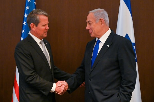 Gov. Brian Kemp, left, and Israeli Prime Minister Benjamin Netanyahu meet in the Israeli leader's Jerusalem office. Their discussion included a question by Netanyahu about the fate of an antisemitism bill that stalled during Georgia's legislative session earlier this year. It will come up for debate again in 2024. Israel GPO/Kobi Gideon