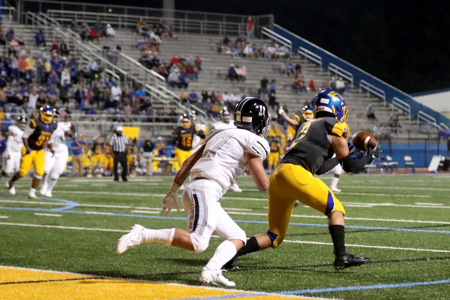 Chattahoochee linebacker Elijah Character (2) intercepts a pass intended for Alpharetta wide receiver Cooper Mendlinger (11) in the first half at Chattahoochee high school Friday, September 25, 2020 in Johns Creek, Ga.. JASON GETZ FOR THE ATLANTA JOURNAL-CONSTITUTION