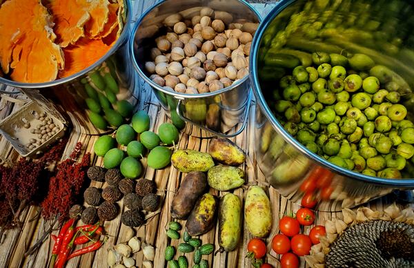 Caleb Arnold of Ever Wilder Farm artfully displays just a few of the fruits, nuts and plants that can be forged in the wild and used for food. 
(Courtesy of Caleb Arnold)