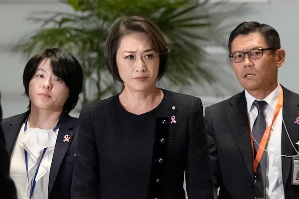 Junko Mihara, minister in charge of Policies Related to Children, walks at the prime minister's office Monday, Nov. 11, 2024, in Tokyo. (AP Photo/Shuji Kajiyama)