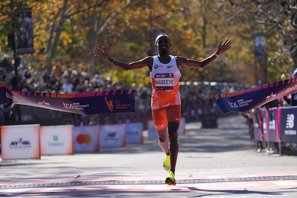 Abdi Nageeye, of the Netherlands, crosses the finish line to win the men's division of the New York City Marathon, Sunday, Nov. 3, 2024, in New York. (AP Photo/Frank Franklin II)