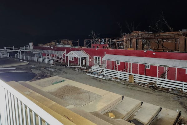 In this photo provided by Missouri State Highway Patrol, a building is damaged after a severe storm passed the area near Ozark County, Mo., late Friday, March 14, 2025. (Missouri State Highway Patrol via AP)