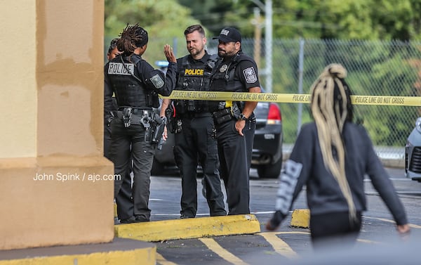 DeKalb police investigate a double shooting at the Oyo Hotel on Wesley Club Drive that left one worker dead and another in critical condition.