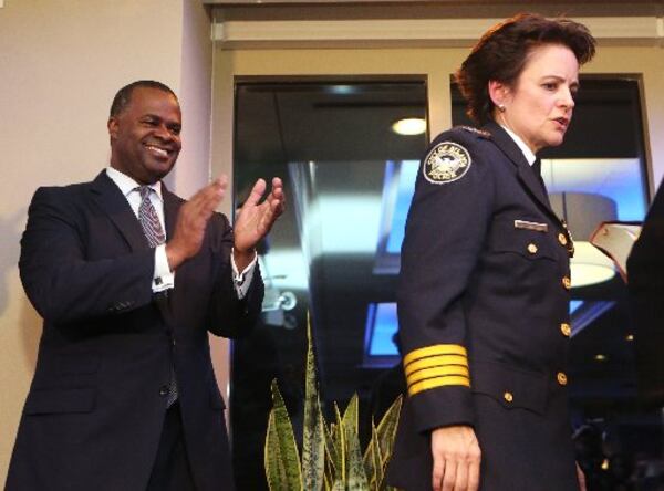 Atlanta Police Chief Erika Shields (right) returned the $10,000 bonus she received from Mayor Kasim Reed’s administration. The $350,000 in bonuses have become controversial at City Hall, with Mayor Keisha Lance Bottoms’ administration suggesting a review to see if they were legal.