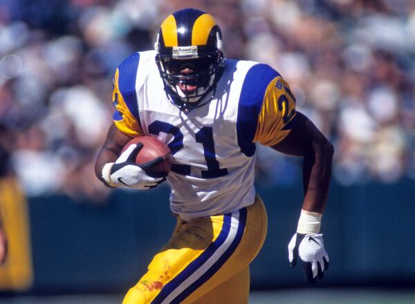 Lawrence Phillips is generally considered one of the worst draft picks in NFL history. (Greg Trott/Associated Press)