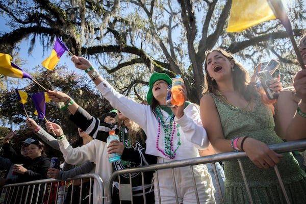 Ashley Pincheon cheers during the St. Patrick's Day parade, Monday, March 17, 2025, in Savannah, Ga. (AP Photo/Stephen B. Morton)