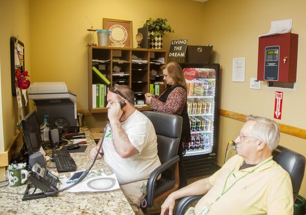 Missy Owen, executive director of the Davis Direction Foundation, and others work at The Zone in Marietta, Georgia, on Monday, June 25, 2018. The Zone is operated under the foundation to support people in recovery. REANN HUBER/REANN.HUBER@AJC.COM