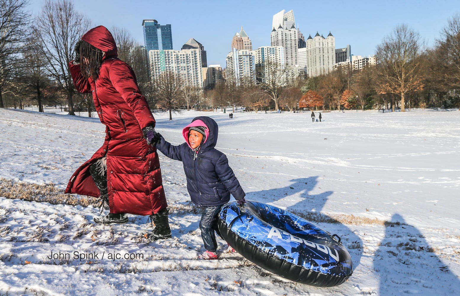 Photos: Frigid cold and snow move in to metro Atlanta