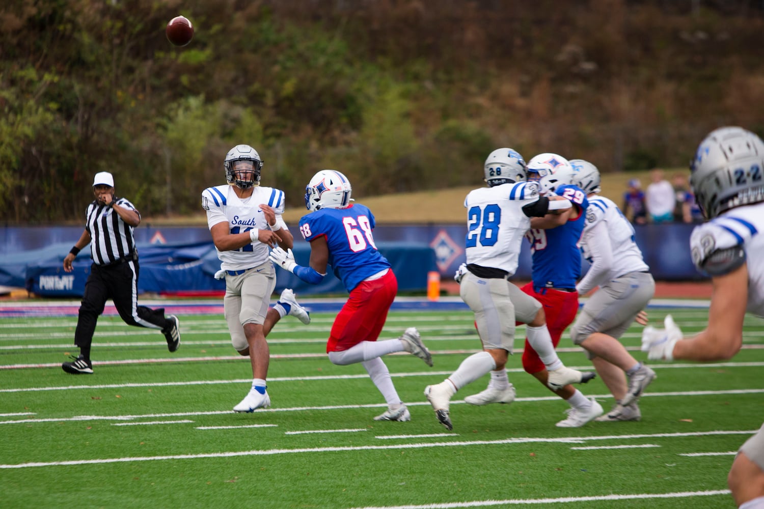 Ty Watkins, quarterback for South Forsyth, passes the ball. CHRISTINA MATACOTTA FOR THE ATLANTA JOURNAL-CONSTITUTION.