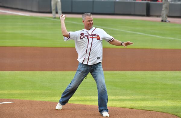 Hall of Famer Chipper Jones throws a ceremonial pitch prior to the game. (Hyosub Shin / Hyosub.Shin@ajc.com)