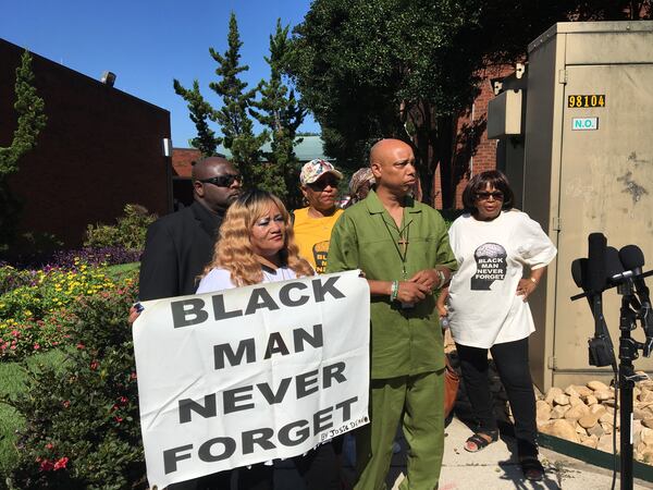 Gerald Rose of New Order National Human Rights Organization and Jose Dean of Black Man Never Forget called for elected officials to take action during a press conference Tuesday after a DeKalb police officer beat a woman at a gas station. MARK NIESSE / MARK.NIESSE@AJC.COM