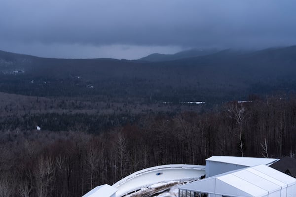 Laurence Bostock, of Britain, slides during his second run at the skeleton world championships, Thursday, March 6, 2025, in Lake Placid, N.Y. (AP Photo/Julia Demaree Nikhinson)