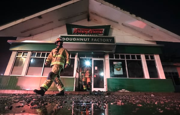  A  fast-moving fire broke out at the landmark Krispy Kreme on Ponce de Leon Avenue early on Feb. 10. John Spink/john.spink@ajc.com)

