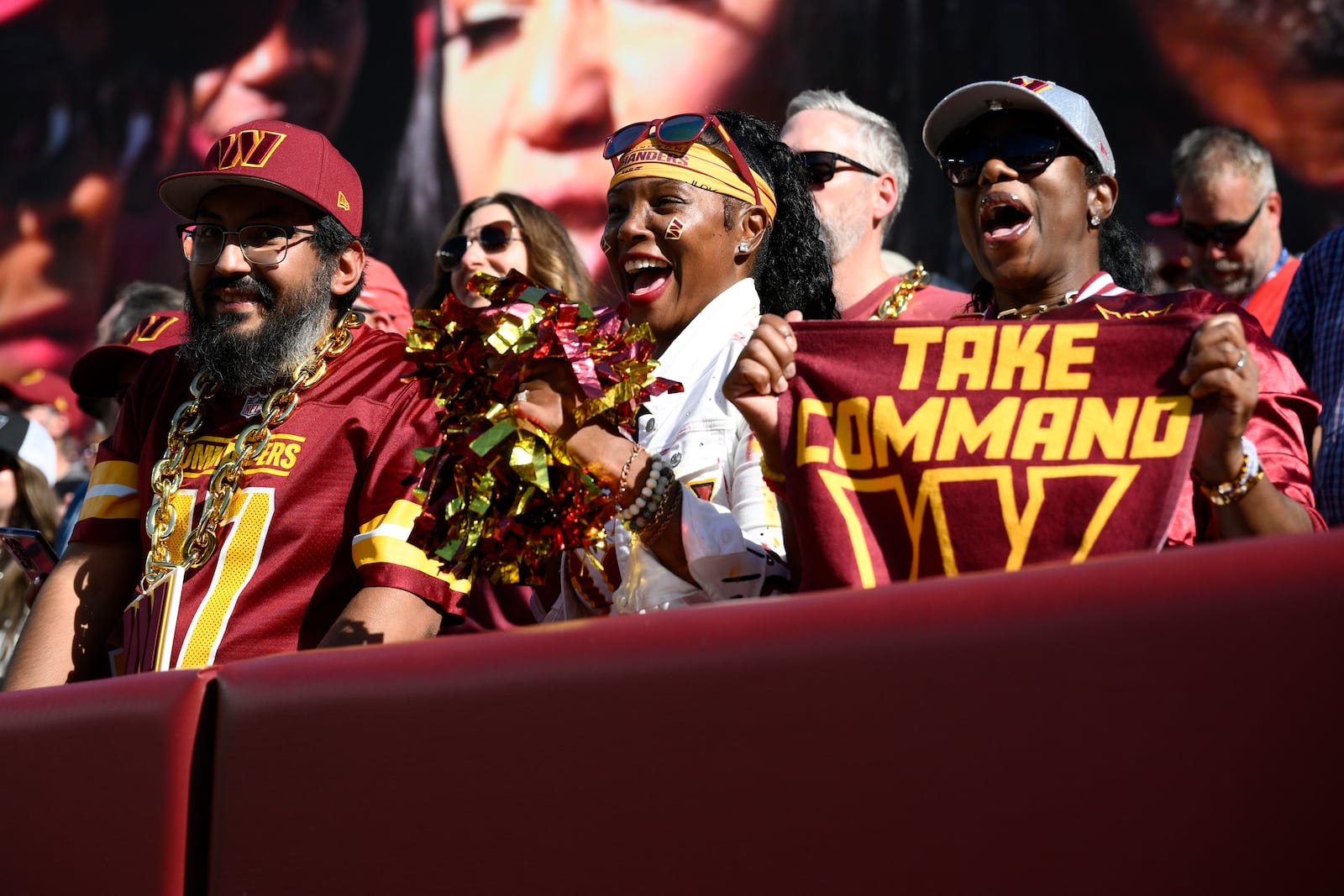 FILE - Spectators react during the second half of an NFL football game between the Washington Commanders and the Cleveland Browns, Sunday, Oct. 6, 2024, in Landover, Md. (AP Photo/Nick Wass, File)