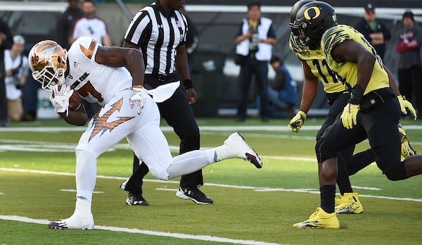 EUGENE, OR - OCTOBER 29: Running back Kalen Ballage #7 of the Arizona State Sun Devils runs in for a touchdown during the first quarter of the game against the Oregon Ducks at Autzen Stadium on October 29, 2016 in Eugene, Oregon. (Photo by Steve Dykes/Getty Images)