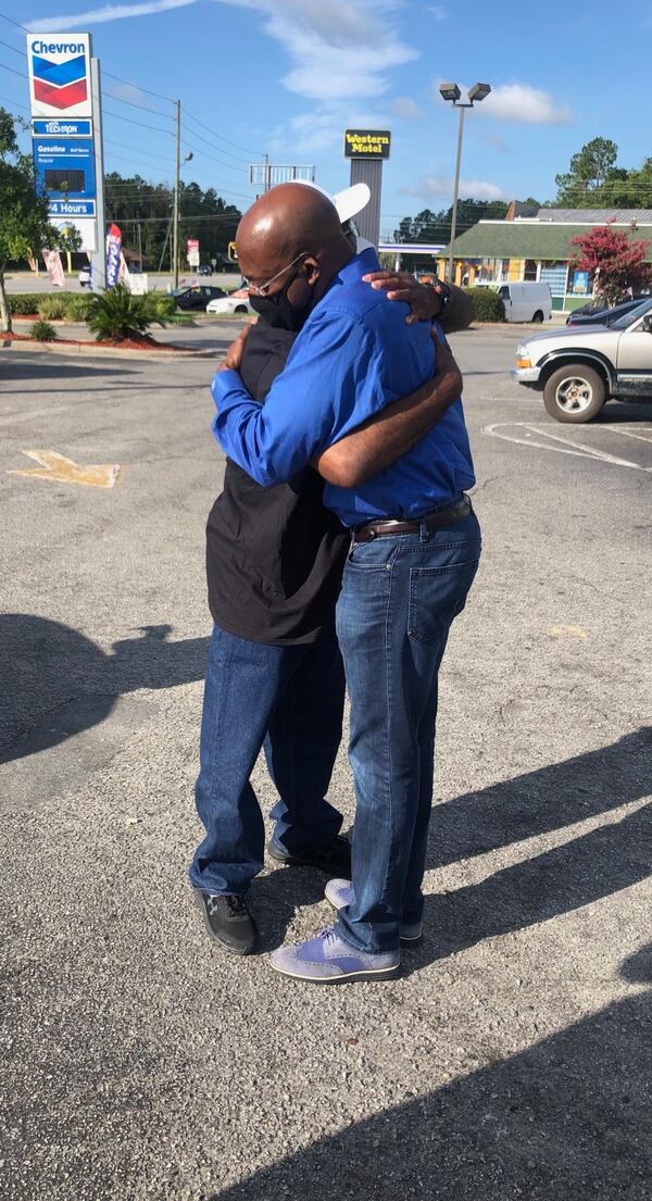 The Rev. Raphael Warnock and his brother Keith reunite.