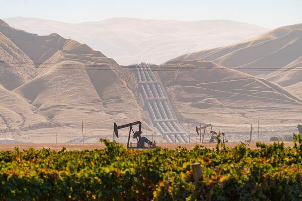 Water flows uphill as it is pumped over the grapevine, en route to Los Angeles at The Los Angeles Aqueduct seen from the south end of San Joaquin Valley, Calif., on Friday, Oct. 25, 2024. (AP Photo/Damian Dovarganes)