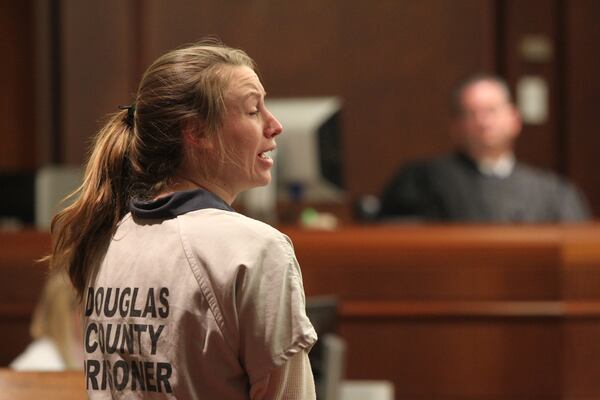 Kayla Norton speaks on her own behalf before Superior Court Judge William McClain on Monday. (Henry Taylor / henry.taylor@ajc.com)