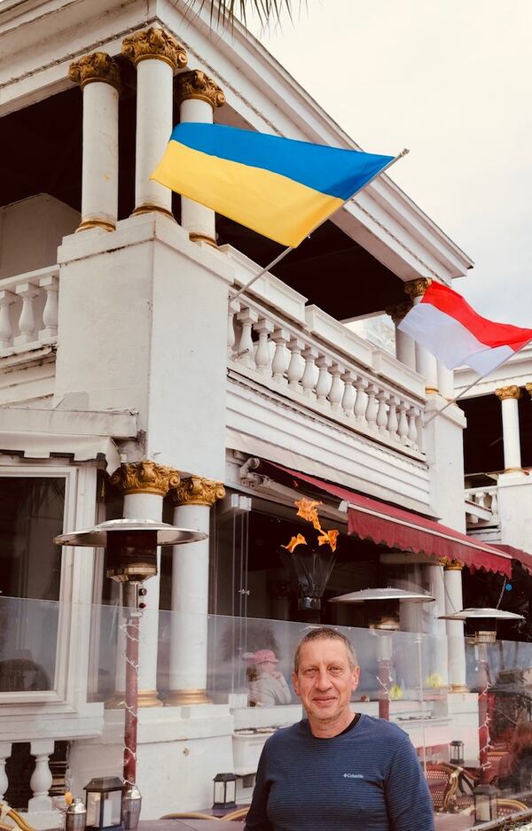 Alex Matsota, standing in front of the Ukrainian flag, is thankful for the support he has received in Duluth.