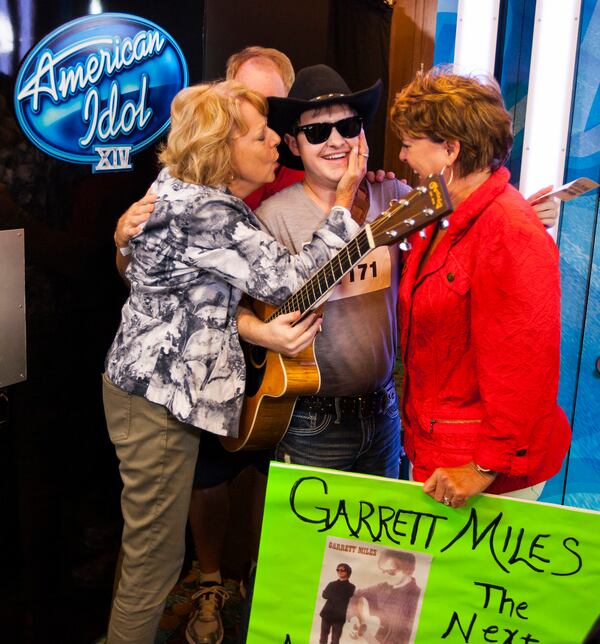 AMERICAN IDOL XIV: Contestant Garrett Miles (center) celebrates after getting his Golden Ticket to Hollywood on AMERICAN IDOL XIV airing Thursday, Jan. 8 (8:00-10:00 PM ET/PT) on FOX. CR: Michael Becker / FOX. © 2014 FOX Broadcasting Co. AMERICAN IDOL XIV: Contestant Garrett Miles (center) celebrates after getting his Golden Ticket to Hollywood on AMERICAN IDOL XIV airing Thursday, Jan. 8 (8:00-10:00 PM ET/PT) on FOX. CR: Michael Becker / FOX. © 2014 FOX Broadcasting Co.