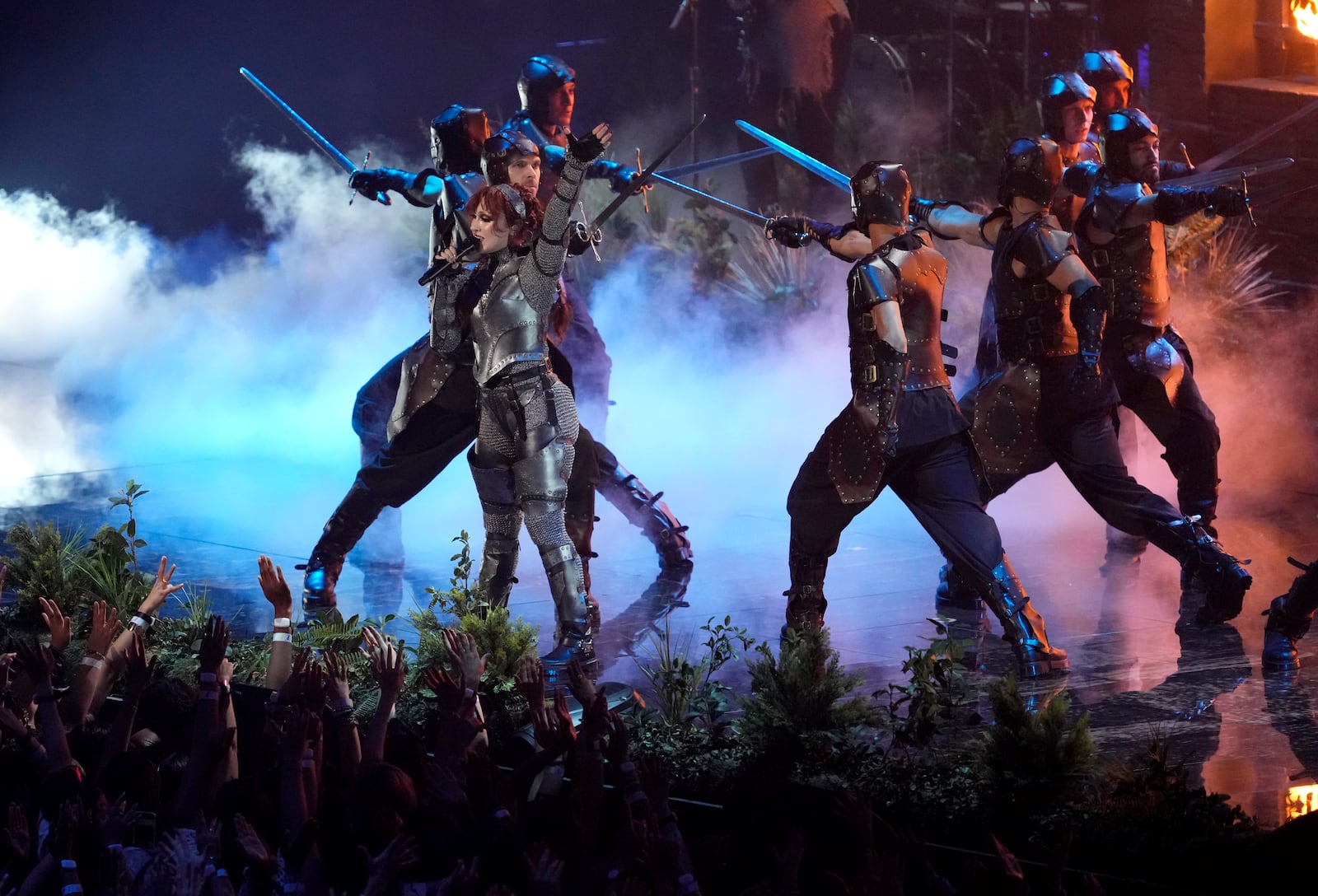 Chappell Roan, center, performs "Good Luck, Babe" during the MTV Video Music Awards on Wednesday, Sept. 11, 2024, at UBS Arena in Elmont, N.Y. (Photo by Charles Sykes/Invision/AP)